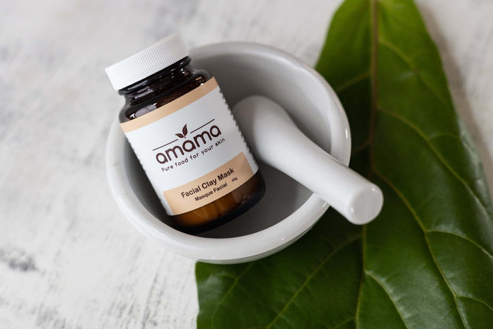 Amama clay mask in a mortar and pestle