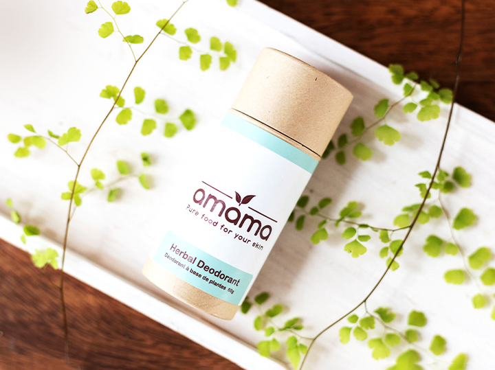 Amama deodorant on a white plate with maidenhair fern
